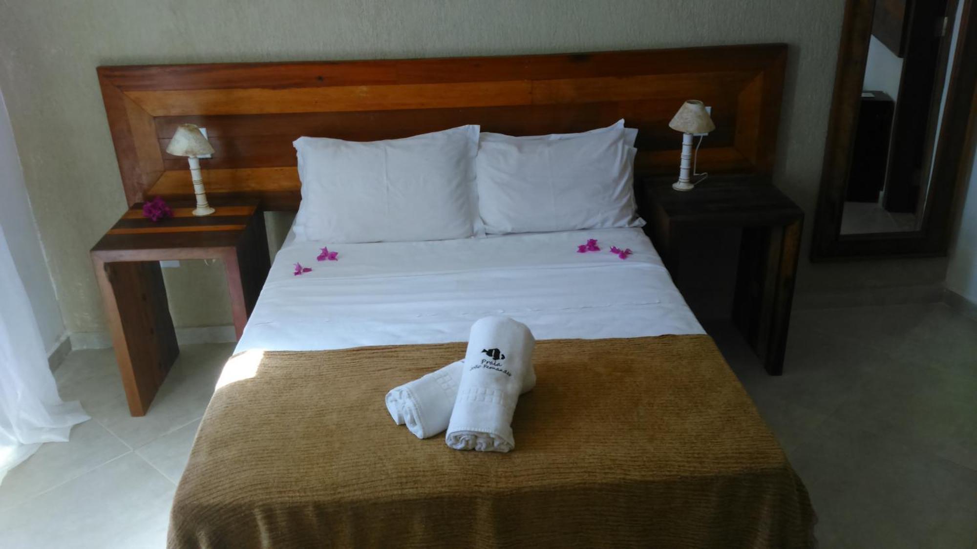 Pousada Praia Joao Fernandes Búzios Exterior foto A bed in a hotel room