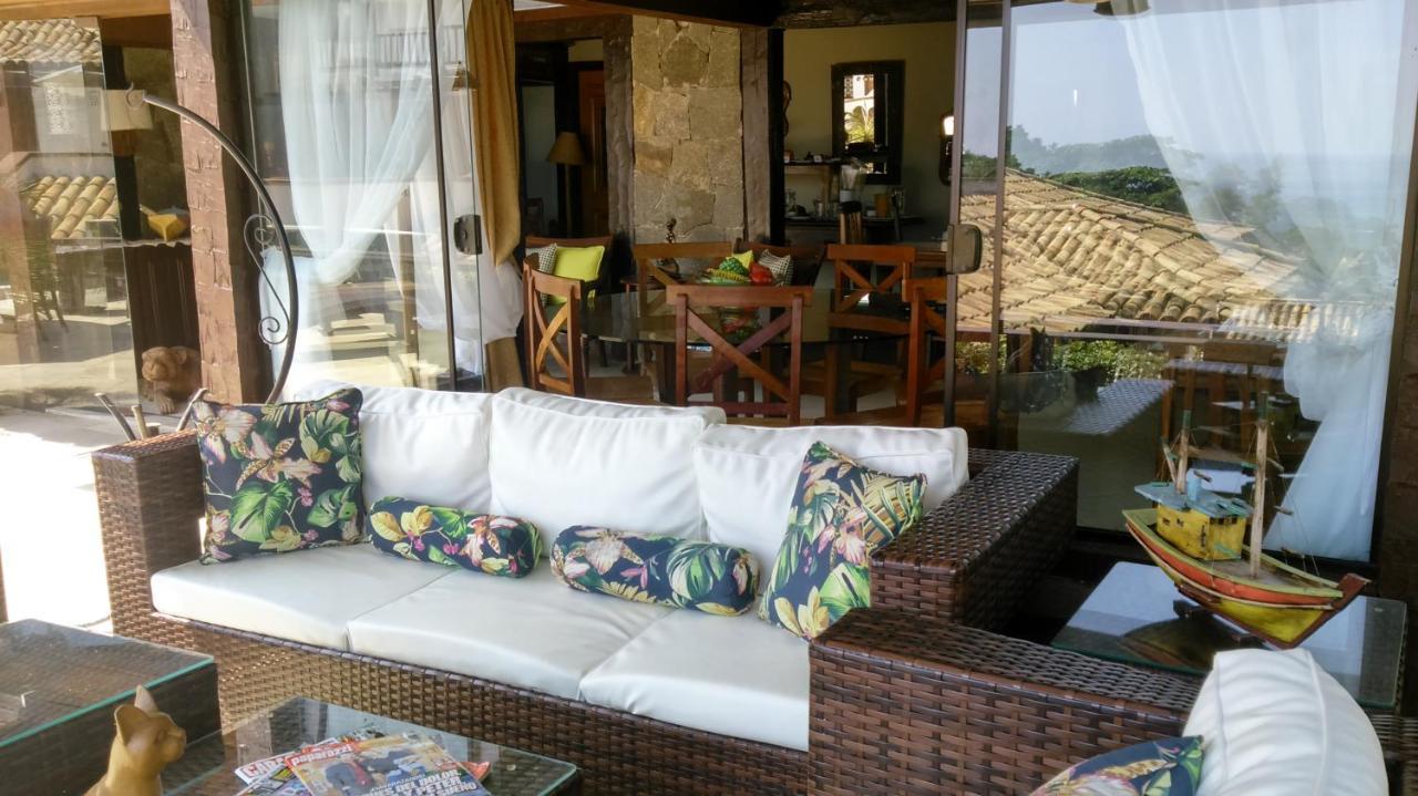 Pousada Praia Joao Fernandes Búzios Exterior foto A rattan sofa